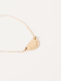 Half Moon Bracelet with 'MAMA' engraved on it